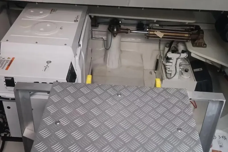  Yacht Photos Pics Engine room of 2021 Sunreef 80 Power yacht with mechanical components visible.