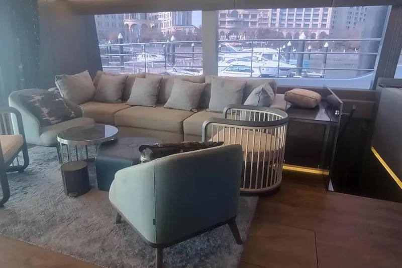  Yacht Photos Pics Luxurious interior of 2021 Sunreef 80 Power yacht with modern seating and marina view.