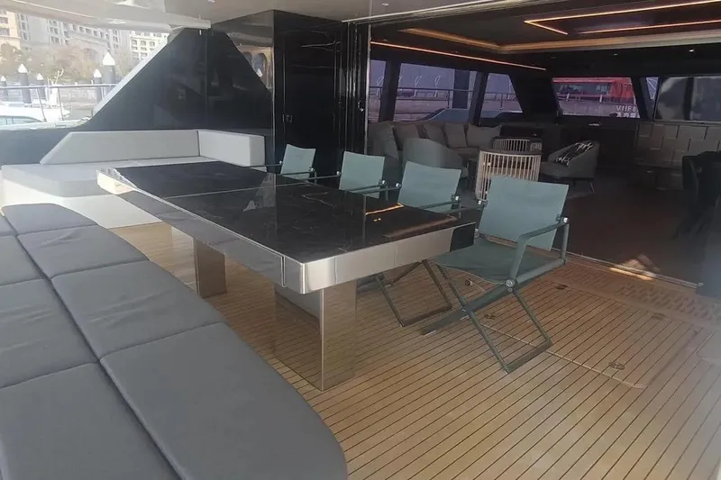  Yacht Photos Pics Luxurious Sunreef 80 Power yacht interior with elegant seating and dining area, 2021 model.