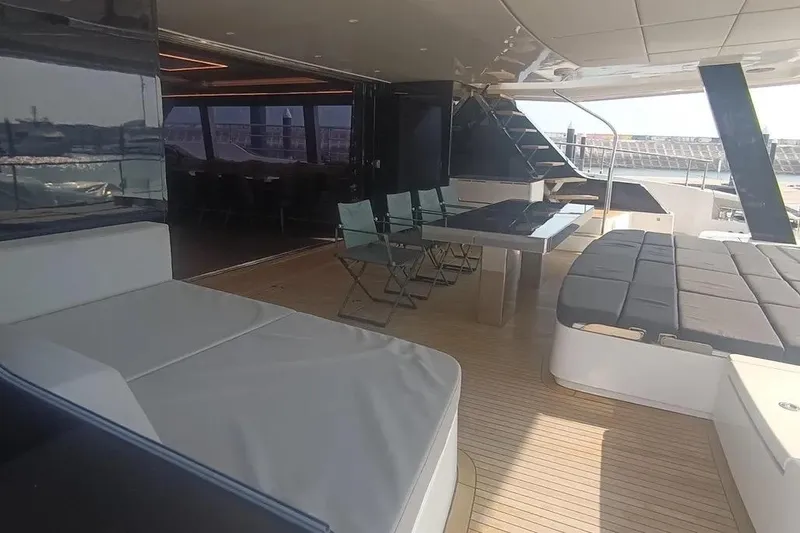  Yacht Photos Pics Luxurious Sunreef 80 Power yacht interior, featuring modern seating and dining area, 2021 model.