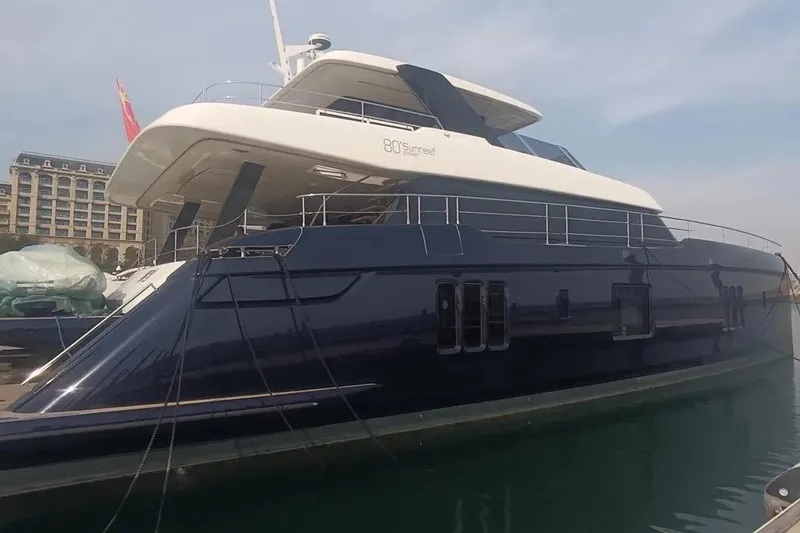  Yacht Photos Pics Luxurious 2021 Sunreef 80 Power yacht docked in marina, showcasing sleek design.