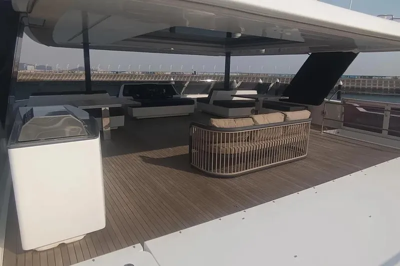  Yacht Photos Pics Luxurious Sunreef 80 Power yacht deck, 2021 model, featuring spacious seating and modern design.