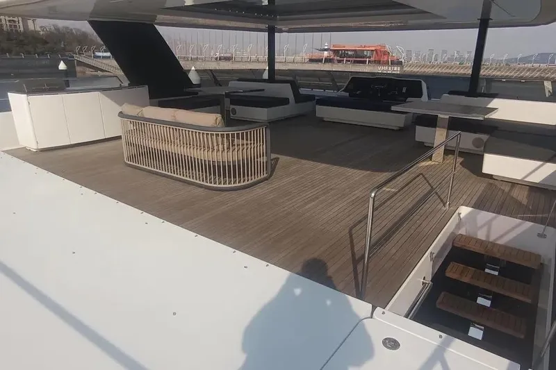  Yacht Photos Pics Luxurious Sunreef 80 Power yacht deck, 2021 model, featuring spacious seating and modern design.