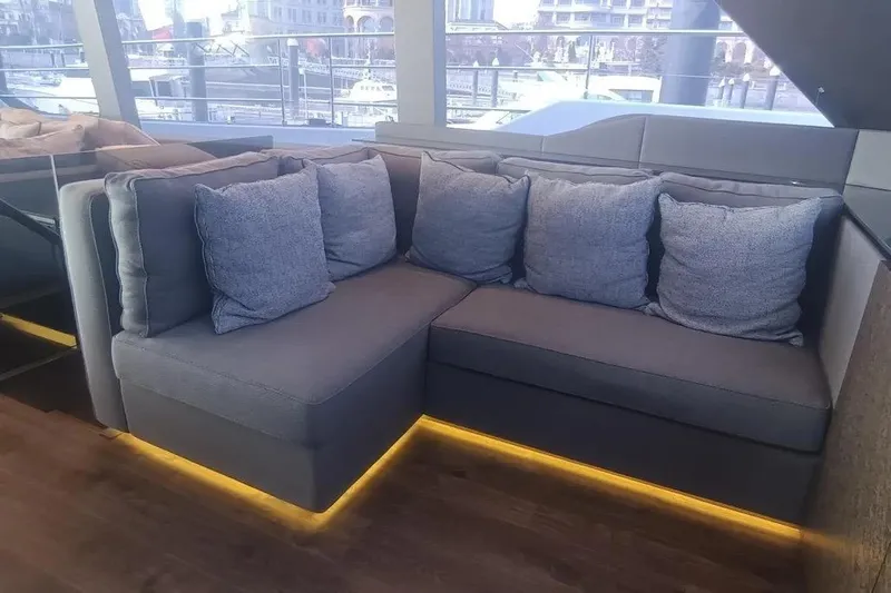  Yacht Photos Pics Luxurious interior seating on 2021 Sunreef 80 Power yacht with plush cushions and ambient lighting.