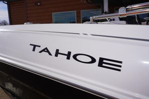 2025 Tahoe T18 boat with sleek white exterior and bold lettering.