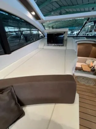  Yacht Photos Pics 2013 Sessa Marine C 48 yacht interior with white and brown seating.