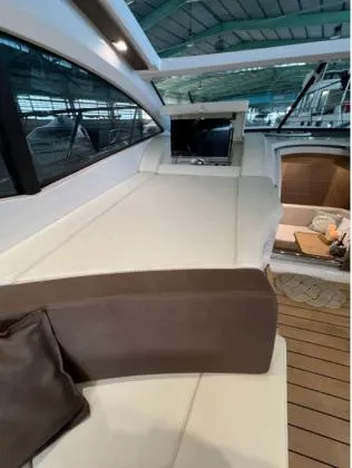  Yacht Photos Pics 2013 Sessa Marine C 48 yacht interior with luxurious seating and TV.