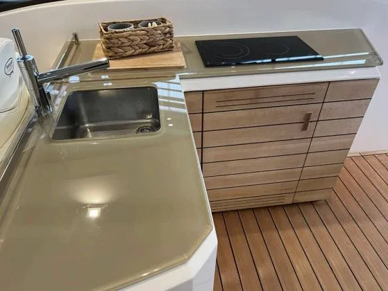  Yacht Photos Pics Modern kitchen area on a 2013 Sessa Marine C 48 yacht with sink and stove.