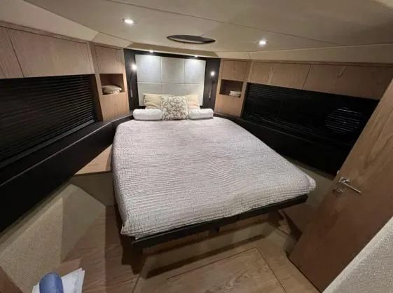  Yacht Photos Pics Luxurious bedroom interior of 2013 Sessa Marine C 48 yacht with modern lighting.