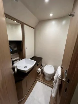  Yacht Photos Pics Modern bathroom on a 2013 Sessa Marine C 48 yacht with sink and toilet.