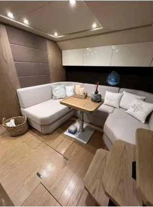  Yacht Photos Pics Luxurious interior of 2013 Sessa Marine C 48 yacht with cozy seating area.