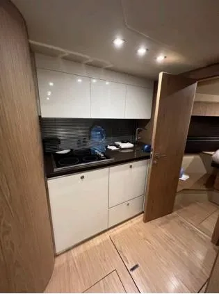  Yacht Photos Pics Modern kitchen area inside 2013 Sessa Marine C 48 yacht.