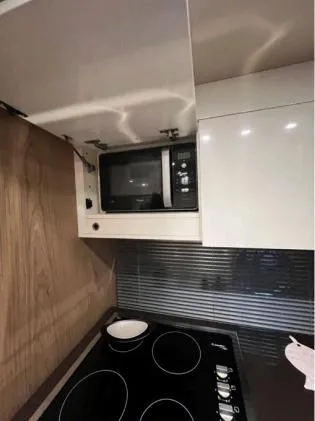  Yacht Photos Pics Modern kitchen in 2013 Sessa Marine C 48 yacht with microwave and stovetop.