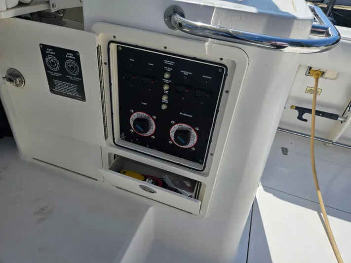  Yacht Photos Pics Control panel on a 2005 Boston Whaler 305 Conquest boat deck.