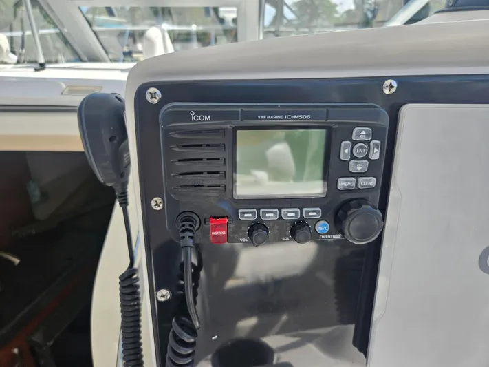  Yacht Photos Pics VHF marine radio on 2005 Boston Whaler 305 Conquest boat dashboard.
