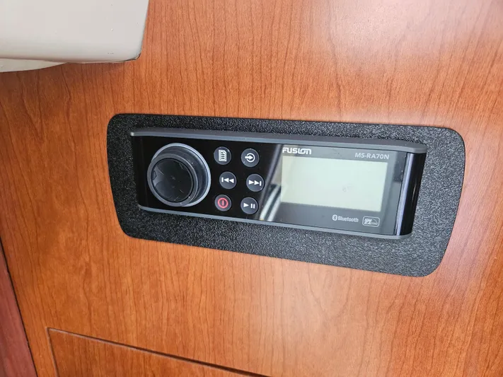  Yacht Photos Pics Fusion MS-RA70N stereo system on 2005 Boston Whaler 305 Conquest boat interior.
