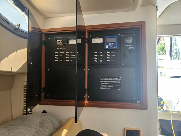  Yacht Photos Pics Electrical panel inside a 2005 Boston Whaler 305 Conquest boat cabin.