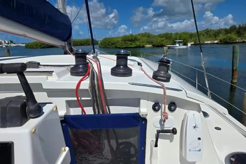 Sunbelievable Yacht Photos Pics 2008 Fountaine Pajot Salina 48 Evolution sailboat deck with winches and ropes.