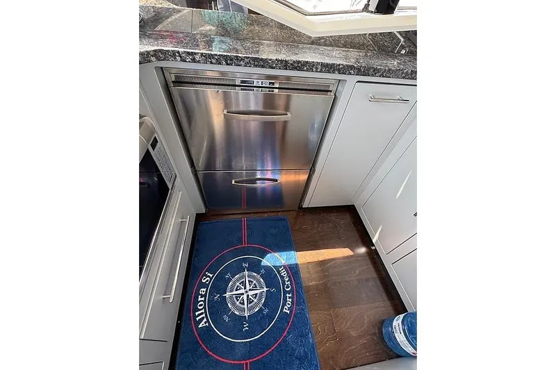  Yacht Photos Pics Stainless steel dishwasher in 2012 Marquis 500 Sport Bridge yacht kitchen.