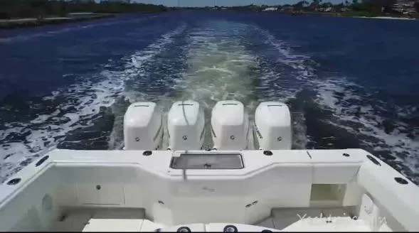 Still Wreckless Yacht Photos Pics 2014 SeaVee 430 SE boat with four engines cruising on open water.