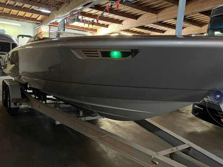 Unique Yacht Photos Pics 2008 Porsche Donzi boat on trailer in indoor storage facility.