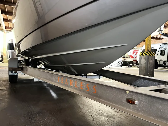 Unique Yacht Photos Pics 2008 Porsche Donzi boat on trailer in warehouse setting.