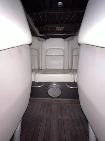 Unique Yacht Photos Pics 2008 Porsche Donzi interior with beige leather seats and wooden flooring.