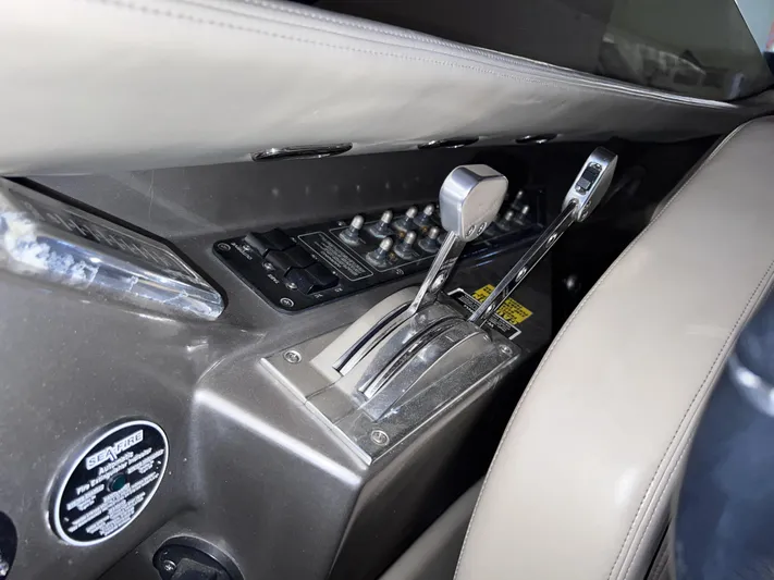 Unique Yacht Photos Pics Interior view of a 2008 Porsche/Donzi dashboard with gear levers and control switches.