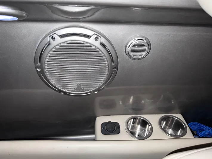 Unique Yacht Photos Pics Interior of a 2008 Porsche/Donzi featuring speakers and cup holders.