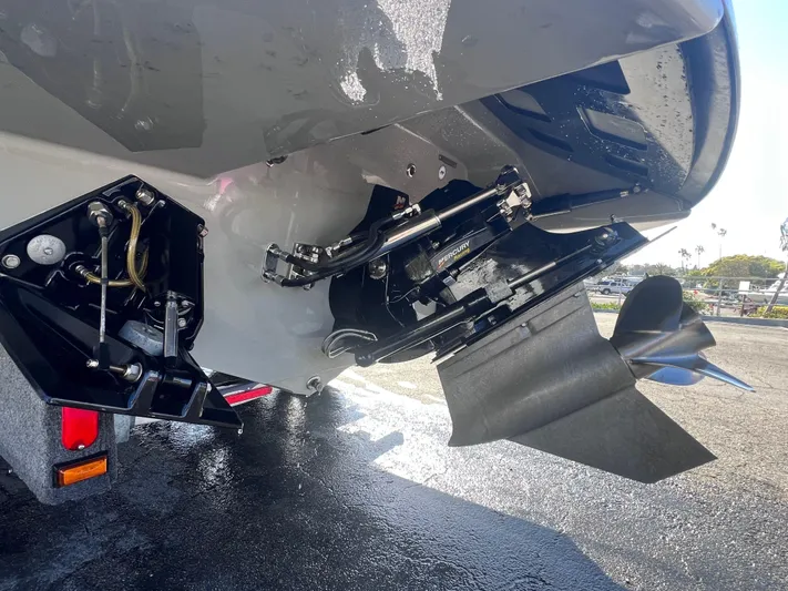 Unique Yacht Photos Pics Close-up of a 2008 Porsche/Donzi boat propeller and stern, showcasing mechanical details.