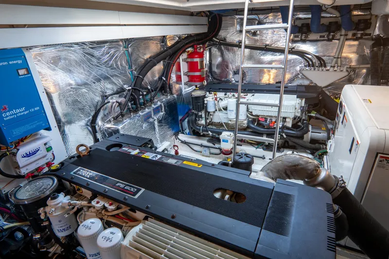 Epic Yacht Photos Pics Engine room of 2013 Cruisers Yachts 48 Cantius, featuring machinery and equipment.