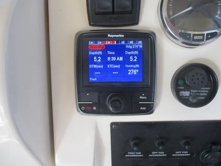  Yacht Photos Pics Raymarine navigation display on 2007 Mainship Pilot 34 Sedan boat dashboard.