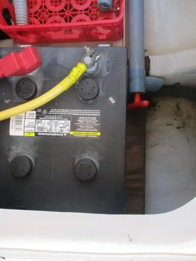  Yacht Photos Pics Battery compartment of 2007 Mainship Pilot 34 Sedan with visible wiring and components.