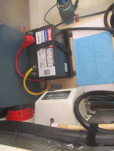  Yacht Photos Pics 2007 Mainship Pilot 34 Sedan engine compartment with battery and wiring.