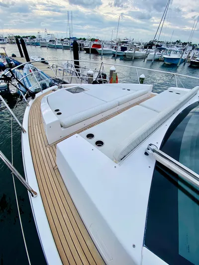 Ivy Therapy Yacht Photos Pics 2015 Azimut 50 yacht with sleek deck design, docked at marina.