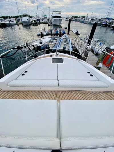 Ivy Therapy Yacht Photos Pics Azimut 50 yacht, 2015 model, docked at marina with spacious deck and seating.
