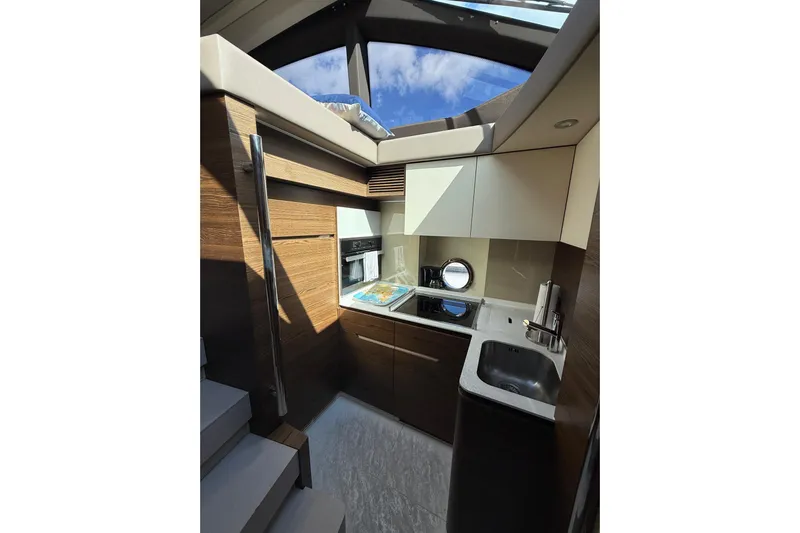 Ivy Therapy Yacht Photos Pics Luxurious interior of 2015 Azimut 50 yacht kitchen with modern amenities.