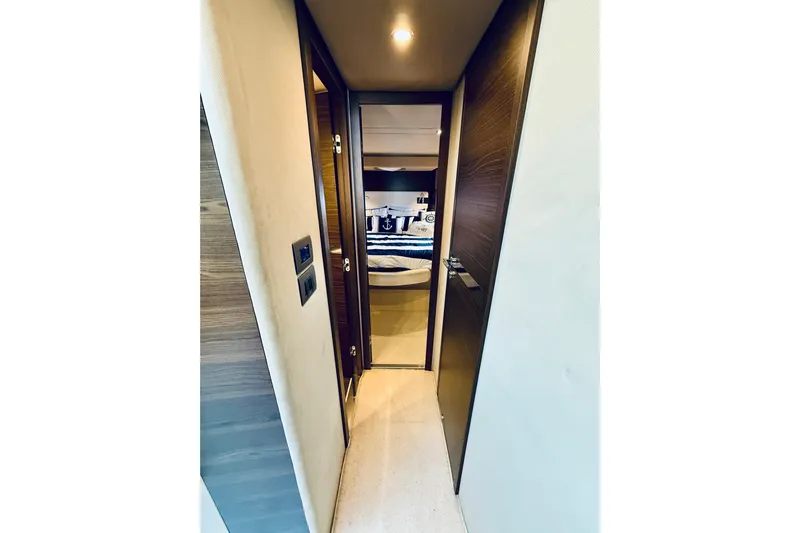 Ivy Therapy Yacht Photos Pics Hallway leading to a bedroom in a 2015 Azimut 50 yacht.