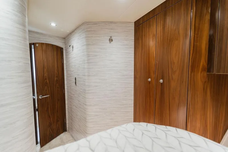 Trailer Trash Yacht Photos Pics Interior of 2021 Viking 58 Convertible yacht with wooden cabinetry and modern design.