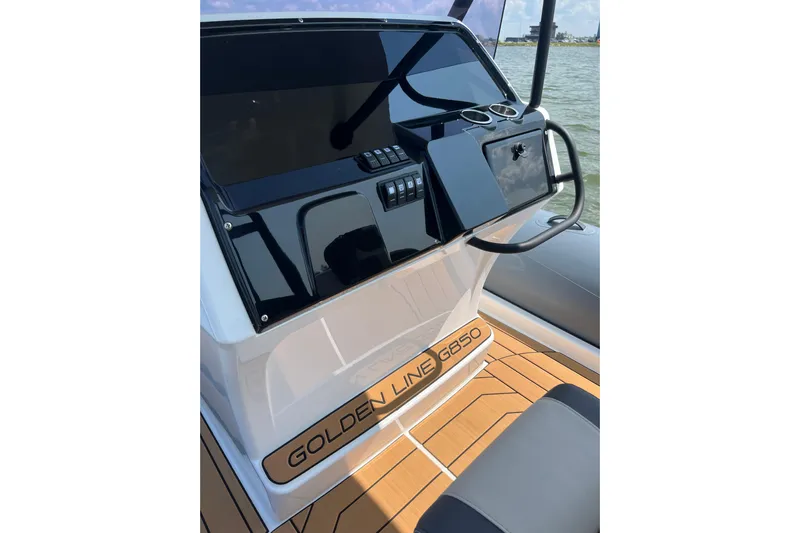  Yacht Photos Pics 2025 Grand Inflatables G850 boat dashboard with sleek design and modern controls.