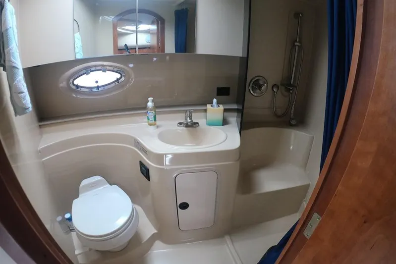 Grand Cru Yacht Photos Pics 2005 Cruisers Yachts 340 Express bathroom with sink, toilet, and shower.