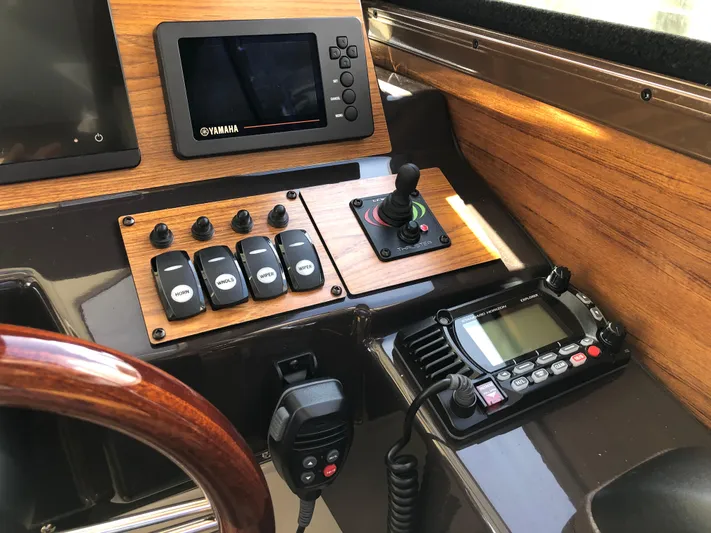  Yacht Photos Pics Control panel of 2022 Ranger Tugs R-27 with navigation and communication equipment.