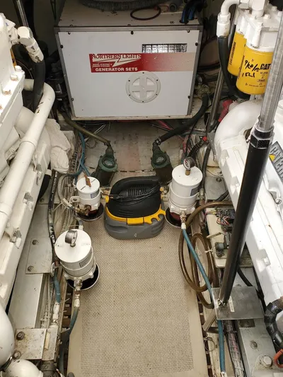 Salty Witch Yacht Photos Pics Engine room of 1998 Grand Banks 38 Eastbay EX with generator and mechanical components.
