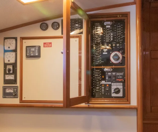 Salty Witch Yacht Photos Pics Electrical panel inside 1998 Grand Banks 38 Eastbay EX yacht, featuring gauges and switches.