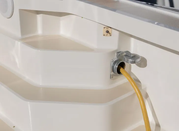 Salty Witch Yacht Photos Pics 1998 Grand Banks 38 Eastbay EX boat with yellow power cable connection.