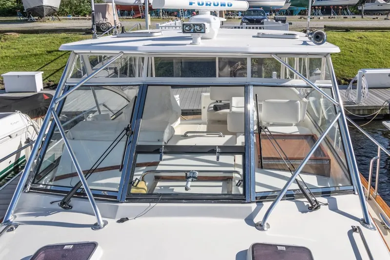 Salty Witch Yacht Photos Pics 1998 Grand Banks 38 Eastbay EX yacht with sleek windshield and spacious cockpit.