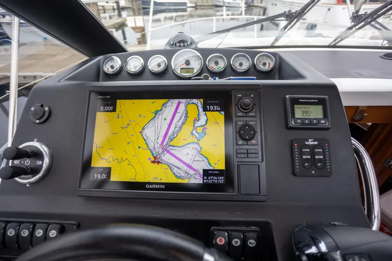 Myrt Yacht Photos Pics Jeanneau NC9 2016 dashboard with navigation system and control gauges.