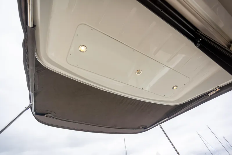 Myrt Yacht Photos Pics 2016 Jeanneau NC9 boat canopy with integrated lights, viewed from below.