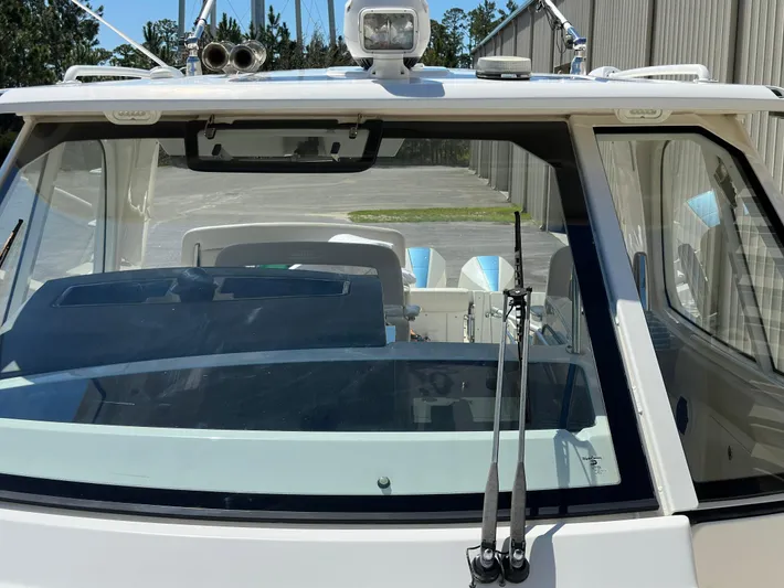 Dream Chaser Yacht Photos Pics 2021 Boston Whaler Realm 380 boat windshield and cockpit view.