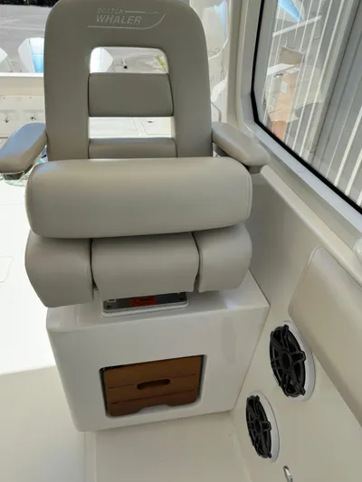 Dream Chaser Yacht Photos Pics Boston Whaler Realm 380 2021 boat seat with storage and speakers.